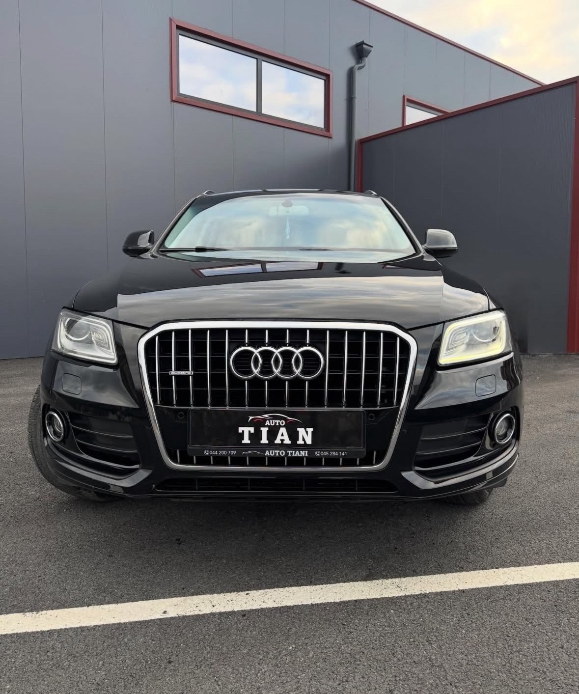 Black Audi sedan with vertical grille