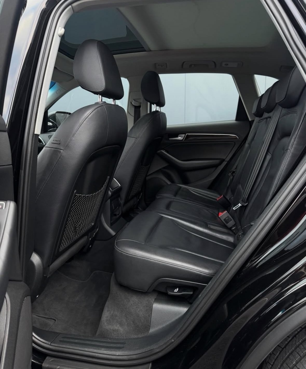 Interior view showing front and rear seats